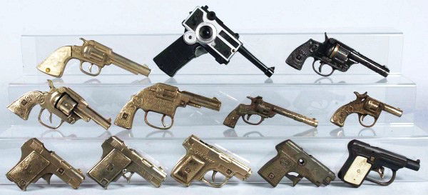 Lot of 12: Cast Iron Cap Guns.: All are working. Size: Largest: 8" L.