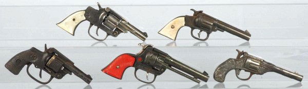Lot of 5: Cast Iron Cap Guns.: Includes one Cowboy, one Six Shooter, one Ranger, and others. Size: Largest: 8 - 1/2" L.