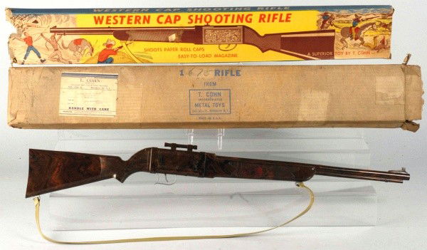 Cohn Western Cap Shooting Toy Rifle.: Rifle is plastic and marked "Superior" on one side. Includes original box and original shipping box. Box has nice color graphics with some tearing and one end missing. Size: 33 - 1/2" L.