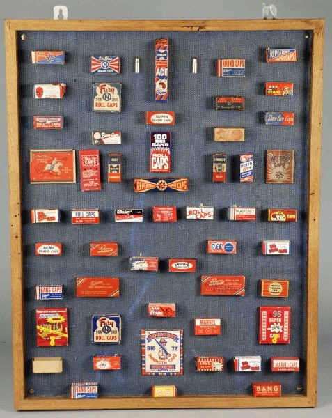 Framed Cap Display.: Looks like most have their caps in the boxes. Size: Framed: 30 - 1/2" x 24".