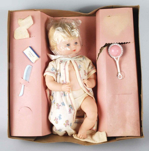 Plastic & Vinyl Newborn Baby Doll.: Old store stock. Original accessories include soap, brush, and rattle. Includes original box with some staining and tearing. Size: Box: 19 - 1/2" x 19 - 1/2".