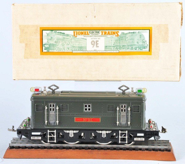 Contemporary Lionel No. 9E Electric Train Engine.: American. Reproduction made by Williams Reproductions Ltd. in Maryland. Includes original box, piece of track, and wooden board. Perfect copy of the classic Lionel pre-war standard gauge engine.