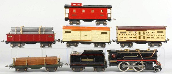 Lionel No. 384 Freight Train Set.: American. Pre-war. Standard gauge. Includes 384E engine and matching tender, 515 lumber car, 513 cattle car, 514 boxcar, 512 gondola car, and 517 caboose. Set has been completely restored.