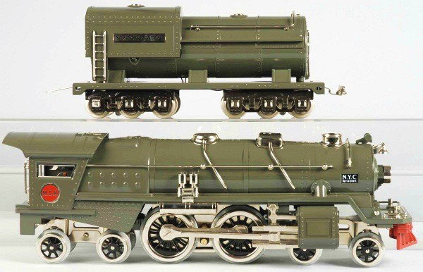 Contemporary MTH No. 400E Locomotive & Tender.: American. Circa 1980s. Standard gauge. Consists of 400E engine and matching tender. Includes original box with some creasing and wear.