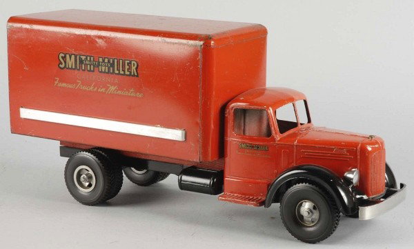 Pressed Steel Smith-Miller Moving Van Toy.: American. Smith-Miller decals on both side doors and rear. Dual rear black rubber tires. Some slight scratching and wear throughout decals and truck. Black frame and fenders have been repainted. Size: