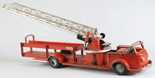 Lot of 2: Pressed Steel Fire Ladder Truck Toys.: Includes one Structo and one Doepke with "Model Toy" decals on rear and "Rossmoyne" decals on both sides of cab. Structo Fire Department truck with "SFD" decals on both sides of rear. Both trucks with