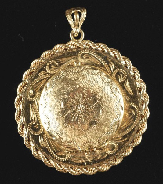 14K Gold Geneva Watch Pendant.: Working. Weight: 13.0 dwt. Size: