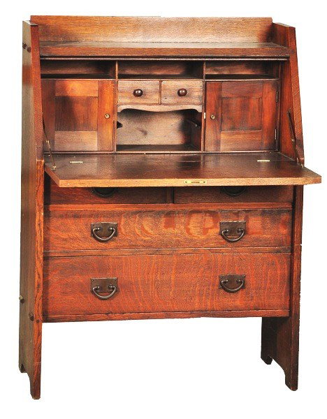 Gustav Stickley Desk.: Original finish. Branded mark on back. Two drawers with original hardware. Veneer damage to top front. Size: 44" T.