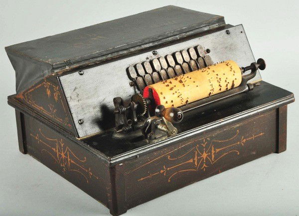 The Gem Roller Organ.: Works well. Has been rebuilt. With seven cobs. Size: 13 - 1/2" x 7 - 1/2".