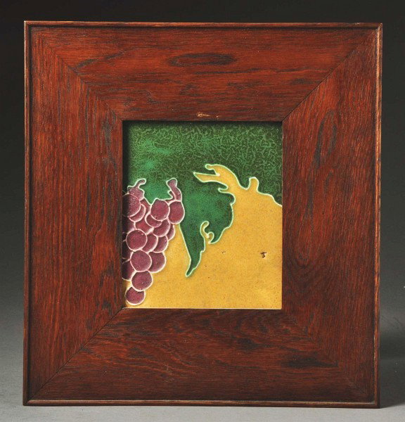 Owens 3-Color Faience Tile.: Depicts a bunch of grapes with a curdled Matte green glaze. In a contemporary oak frame. Size: Framed: 11 - 3/4" x 11".