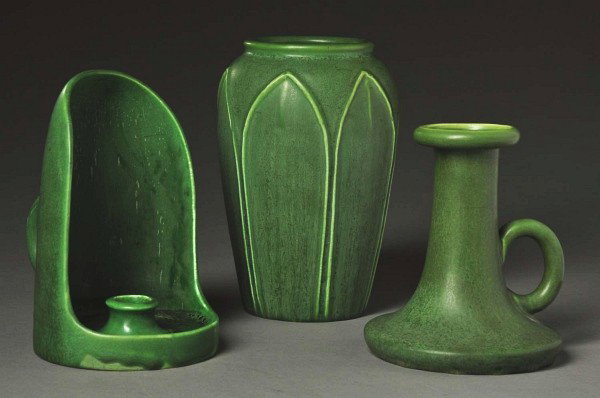 Lot of 3: Arts & Crafts Hampshire Pottery.: Includes a shielded candle holder, a ring handled candle holder, and a leaf design vase. A small glaze pop on one raised leaf on the vase. All three with great Matte green glaze. Size: Largest: 7 - 1/