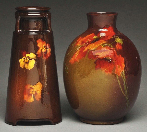 Lot of 2: Roseville Vases.: Includes a Roseville Rozane Ware Royal three-handled vase with wafer, floral design and restoration to inner part of under base. Also a Roseville impressed Rozane with floral decoration. Size: Largest