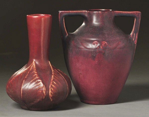 Pair of Van Briggle Vases.: Both marked 1918. Includes one double handled mulberry vase with banded Art Nouveau decorations. Small factory stilt pull to base and side. Also a leaf decorated mulberry vase with raised leaf design