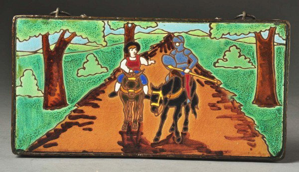 Sevilla Red Clay Multi-Colored Painted Tile.: Signed Jose Mensaque. Depicts two figures on horseback; one as a knight in armor. In a hammered iron fame with original hooks. Size: 11" x 5 - 3/4".