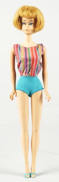 Ash Blonde American Girl Barbie Doll.: 1965 Bendable leg Doll in original swimsuit with shoes. Includes booklet. (Excellent condition, legs click well). Size: