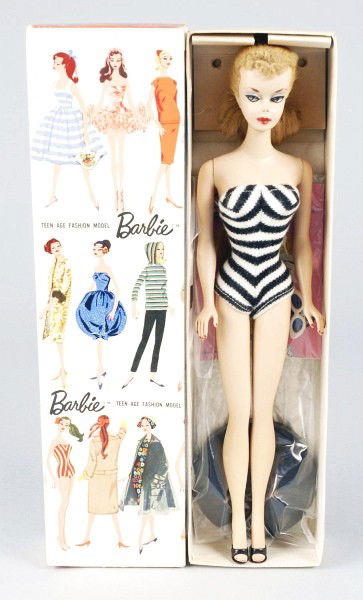Blonde No. 1 Barbie Doll in Box.: 1959 Original Barbie wearing original swimsuit, two pronged rare posing stand, gold hoop earrings, booklet and shoes. (Excellent condition, original hair set). Size: