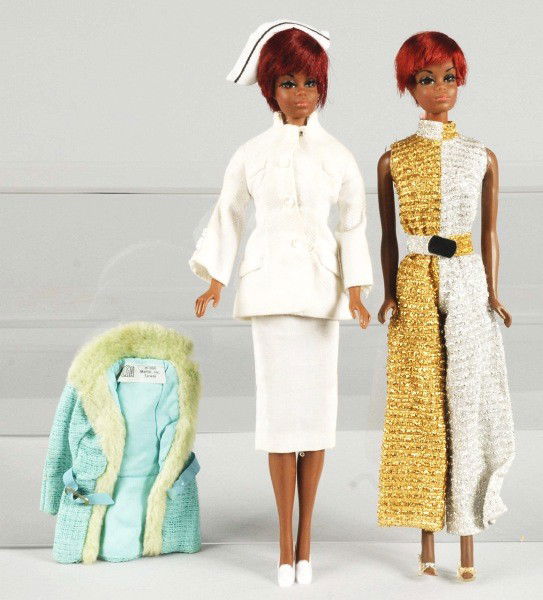 Lot of 2: Mattel Julia Dolls.: Talking and Twist waist Julia dolls from 1969. Talking Julia doll is wearing her original lame' jumpsuit and glitter shoes. Twist 'n Turn Julia is wearing top to the two piece uniform with hat. Includ