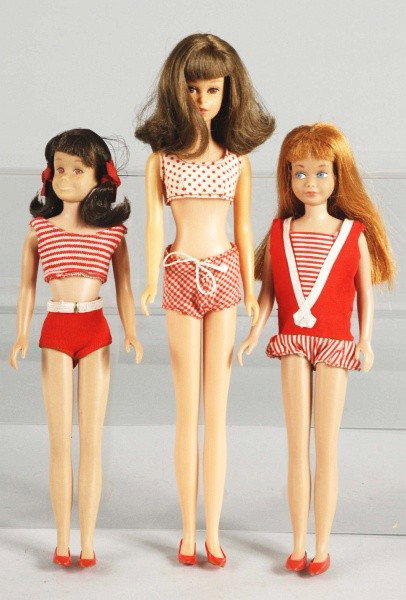 Lot of 3: Skipper & Francie Dolls.: 1965 Skooter doll, brunette, original swimsuit, original hair ribbons, and shoes (Near mint). Titian Skipper doll in original swimsuit (Excellent). 1966 Brunette straight leg Francie doll wearing orig