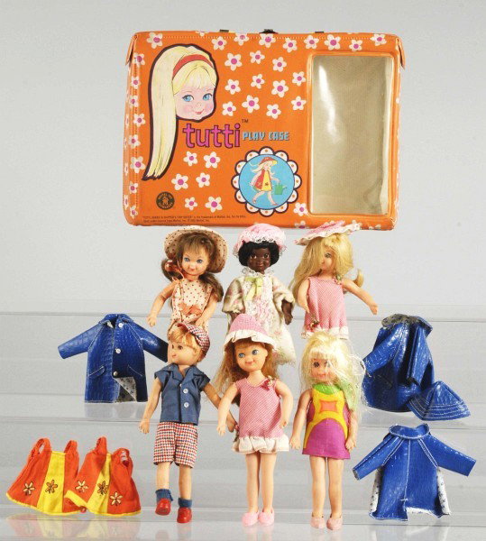 Mod Tutti Case with Six Dolls & Clothing.: 1966 mod orange Tutti case. Six dolls include Chris, Todd, Nan, and three Tutti dolls. Also includes lots of clothing, most of which is tagged for Tutti. Size: