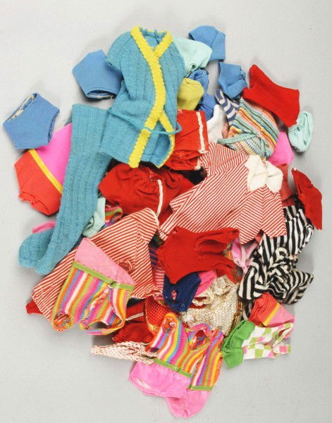 Original Barbie Swimsuits & Fashions.: Large lot of original swimsuits include the iconic black and white stripe bathing suit and others from early to the 70s including Ken, Midge, Walking Jamie, and more. Size: