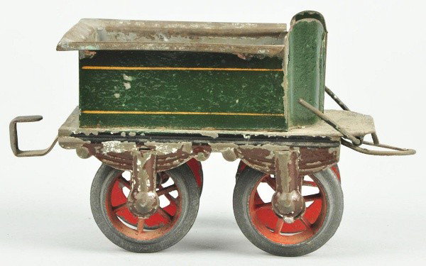 Handpainted Four Wheel Train Tender.: German. Circa 1905. Probably Carette. Unusual front scissors coupler mechanism. Some minor paint flaking. Size: