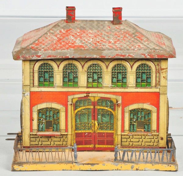 Lithographed Carette O Gauge Train Shed.: German. Base and roof are handpainted and sides are lithographed. Some denting and paint flaking throughout. Size: