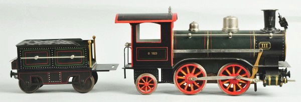 Reproduction Marklin Gauge 3 Train Loco & Tender.: German. Clockwork motor is vintage Marklin. Engine marked number "1023" and four wheel tender with cast iron wheels. Very nice copy of a rare locomotive. Four-inch scratch to top of cab roof. Size: