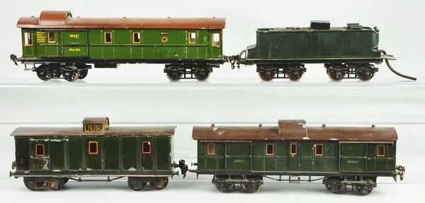 Lot of 4: Marklin Gauge 1 Train Items.: German. Includes PLM live steam tender, 18441 baggage car, 19341 baggage car, and 16269 baggage car. Paint flaking to roofs. Size: