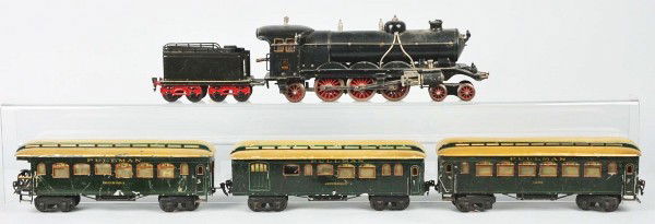 Marklin Gauge 1 Steam-Type Passenger Train Set.: German. Handpainted. Includes H4021 engine with forward and reverse gears, eight wheel tender, and three passenger cars with interiors. Passenger cars include a Louisiana observation, 1903 pullman, an
