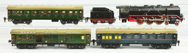 Marklin HR Passenger Train Set.: German. Late pre-war. Bicycle mark. Includes electric steam-style locomotive with tender and three passenger cars with missing interiors. Passenger cars include a blue dining car, 19410 green passenge