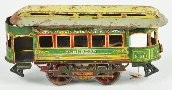 Ives O Gauge No. 810 Suburban Train Trolley.: American. Pre-war. Electric motor, lithographed sides, and handpainted roof. Headlight added to one end and paint flaking to roof. Size: