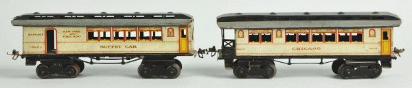 Lot of 2: Ives 1 Gauge Passenger Train Cars.: American. Scarce white color with low sides. Includes 72 Chicago pullman car with lithographed sides and 71 New York & Chicago buffet car. Missing celluloid windows and some minor scratching to roofs.