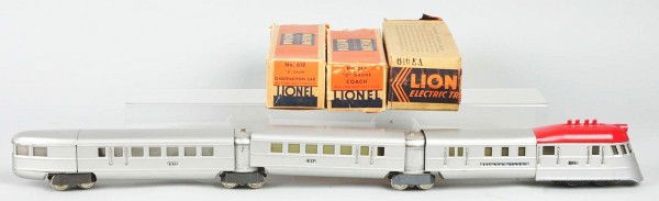 Lionel O Gauge Flying Yankee Train Set.: American. Pre-war. Includes 616 power unit, 617 coach, and 618 observation car. Comes with two vestibules. Some scratching throughout cars and engine has been repainted to look like the scarce red cap