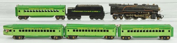 American Flyer Streamline Passenger Train Set.: O gauge. Includes Hudson steam locomotive, American Flyer Lines tender, and four Streamline two-tone green passenger cars with vestibules. Moderate scratching and wear throughout. Size: