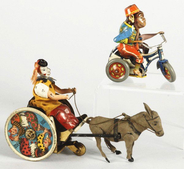 Lot of 2: Tin Litho Wind-Up Toys.: German. Working. Includes Lehmann Bulky Mule with original legs, ears, and Lehmann bell mark on wheels. Also includes Arnold monkey motorcycle toy marked "US Zone Germany". Very little wear overall. S