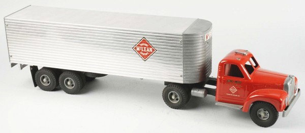 Lot of 2: Pressed Steel Smith-Miller Truck Toys.: Includes one Watson Brothers tractor trailer MIC model and one McLean two piece tractor trailer. Both are new old store stock. Size: Largest: 30 - 1/2" L.