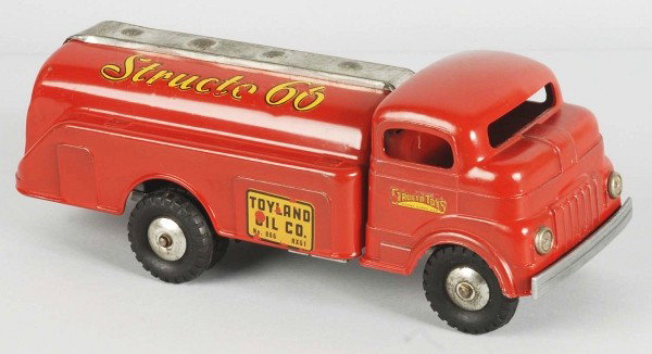Lot of 4: Pressed Steel Structo Truck Toys.: Late 1950s to 1970. Includes one oil truck, one motor express truck, one tow service truck that is unassembled and missing boom, and one emergency van truck in original box. Size: Largest: 13 - 1/2" L