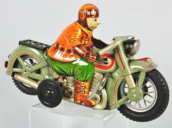 Tin Litho Harley Davidson Motorcycle Friction Toy: Japanese. Working. Made by Yonesowa. Marked "Harley Davidson" on sides of gas tank and "I.Y Metal Toys" on rubber wheels. Original crash bars and headlight. Very minor wear overall. Size: 15" L.