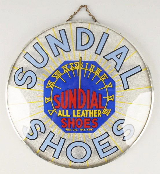 Unusual & Rare Gilco Sundial Shoes Sign.: 1930s. Nice, bright reverse on glass convex lens on top of a textured silver background. Original chain hanger and rim. Sign has never been illuminated but probably could be adapted to light up. Only