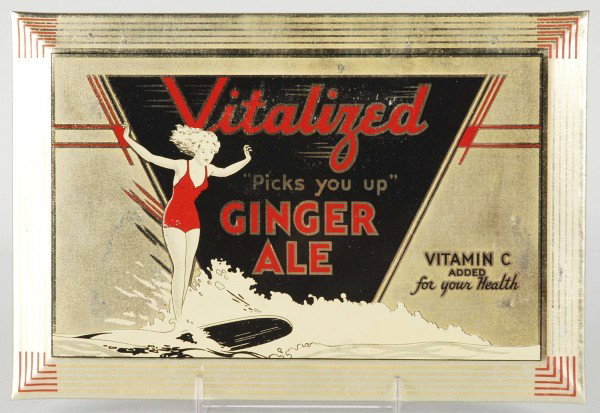 Tin Over Cardboard Vitalized Ginger Ale Sign.: Circa 1930s. Complete with original paper envelope. Great graphics with girl on surfboard. Sign has never been used and exhibits only minor rubbing and the lightest of any wear. Size: 6 - 1/4" x 9 - 1