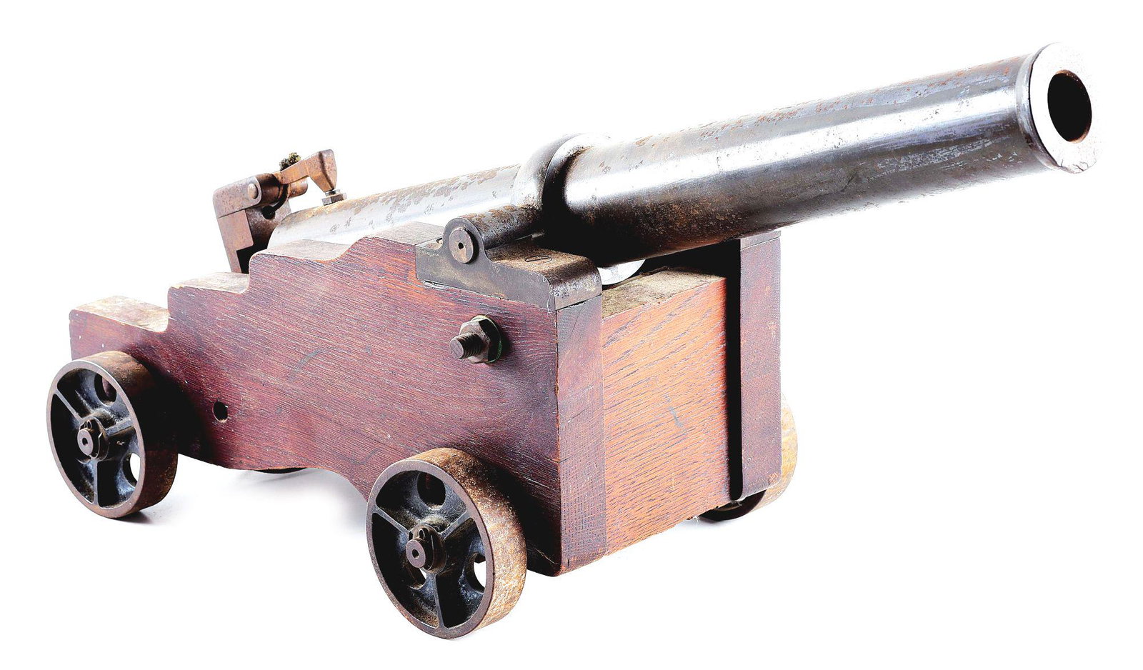 SMALL SIGNAL CANNON WITH CARRIER.: Small unmarked steel muzzle loading signal cannon measuring approximately 24" long from breech to cascabel and 8" wide. Bore diameter measures approximately 1 - 1/4". Wheeled wooden carrier with four 