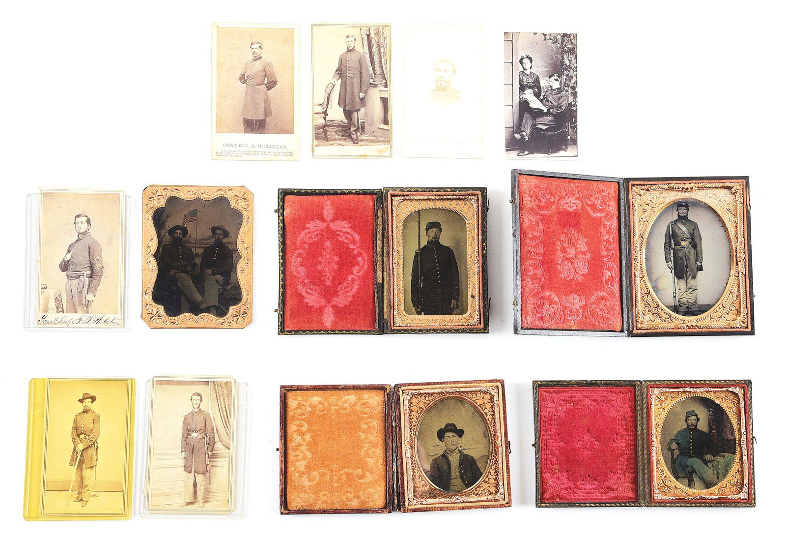 LOT OF 13: CIVIL WAR PHOTOGRAPHS.: Lot consists of 13 original Civil War photographs: 4 ambrotypes in embossed leatherette cases, 1 uncased tintype, 8 carte-de-visite format albumen images, including one engraving. A) McClellan as Majo