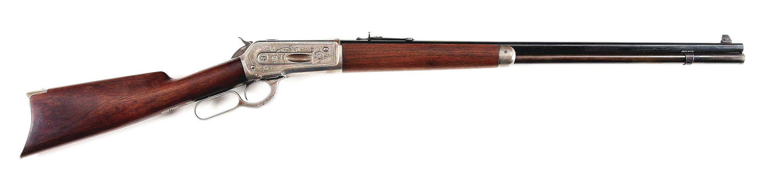 (C) ENGRAVED WINCHESTER MODEL 1886 LEVER ACTION RIFLE.: Winchester Model 1886 lever action rifle made by Winchester Repeating Arms in 1902. 26" tapered round blued rifled barrel with Winchester 2 line address, Lyman bead front sight, Buckhorn rear sight, a