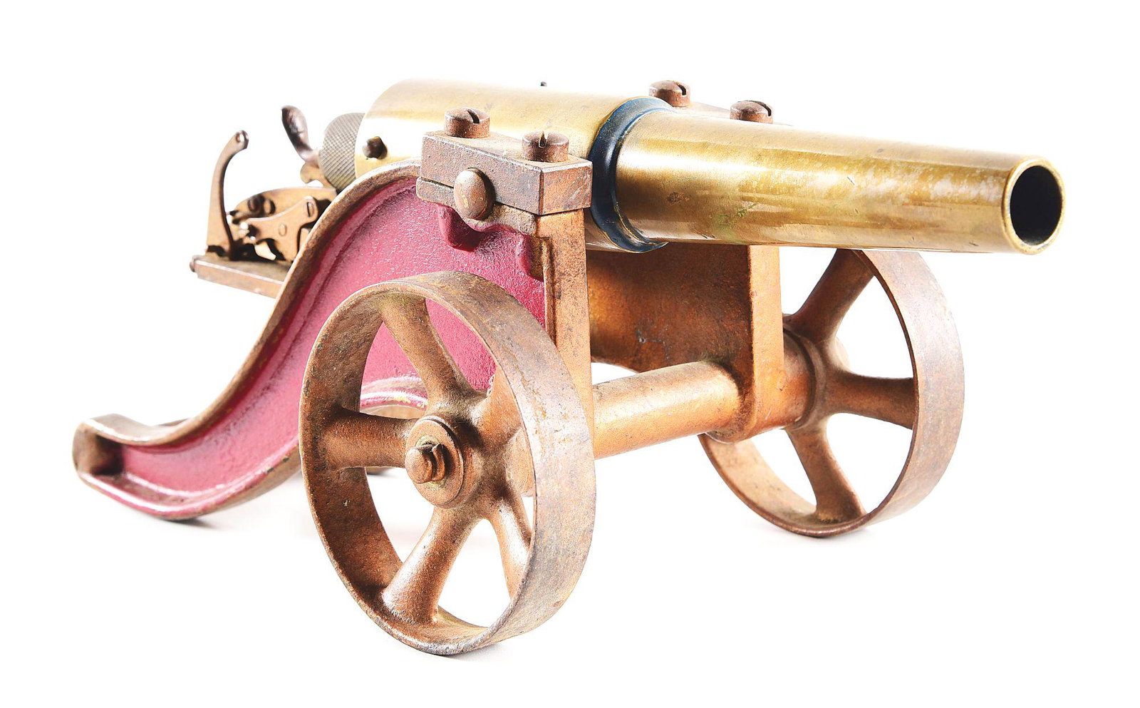 INTERESTING UNMARKED 10 GAUGE BREECH LOADING BRASS: This diminutive signal cannon features an 8 - 1/2" brass barrel with removable breech retained by a cross pin. An external hammer shogun lock has been fitted to fire the cannon. The assembly is mounte