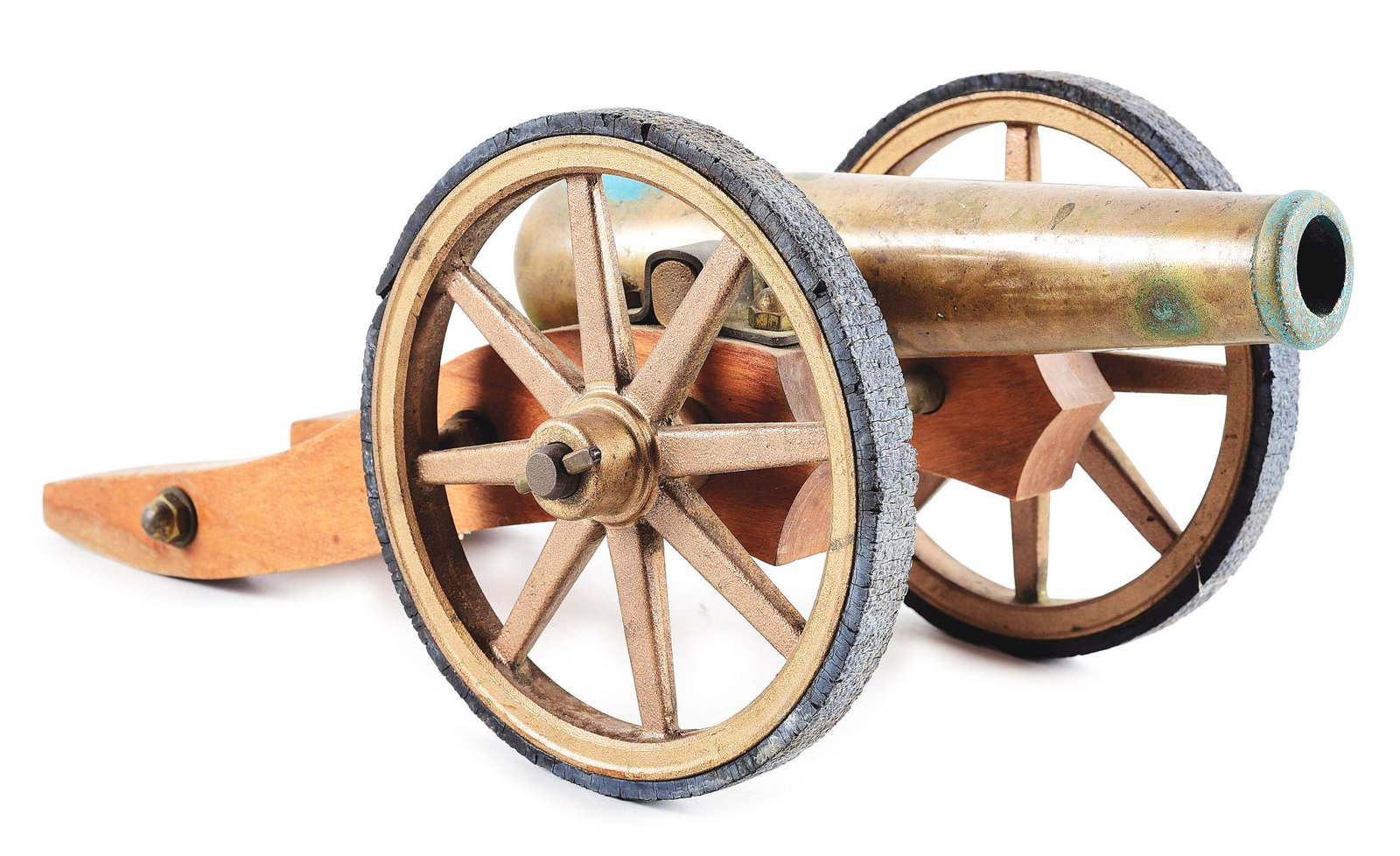 SMALL BRASS CANNON REPLICA.: Unmarked small brass cannon with artillery style wooden carriage. Carriage consists of 2 copper-colored cast iron wheels with flat rubber tires and a wooden stock. Length of cannon alone measures appr