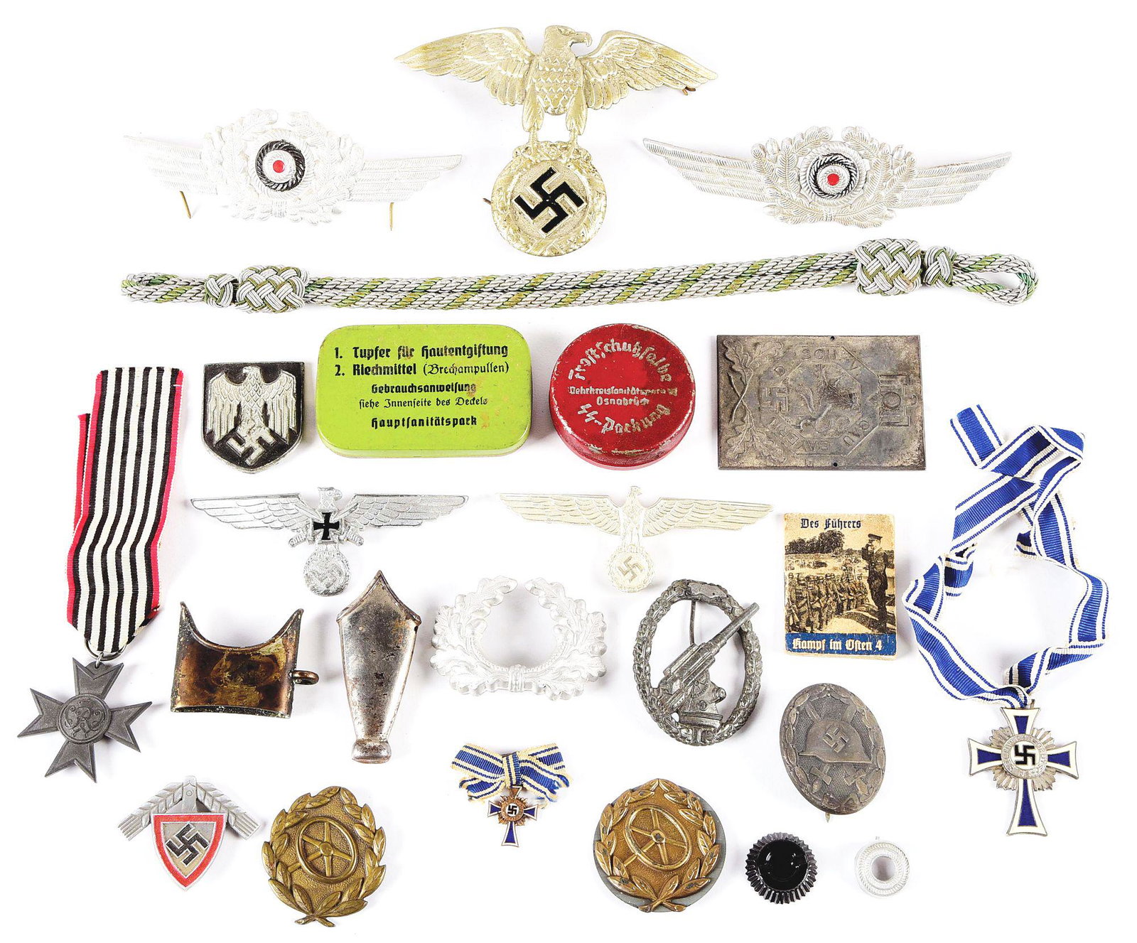 LOT OF MISCELLANEOUS THIRD REICH MEDALS AND INSIGNIA.: Miscellaneous Third Reich medals and insignia. Lot contains a Luftwaffe Flak badge (missing its eagle), visor cap cockades and wreaths, driver trade badges, cap eagles, Mother's crosses, etc. CONDITIO