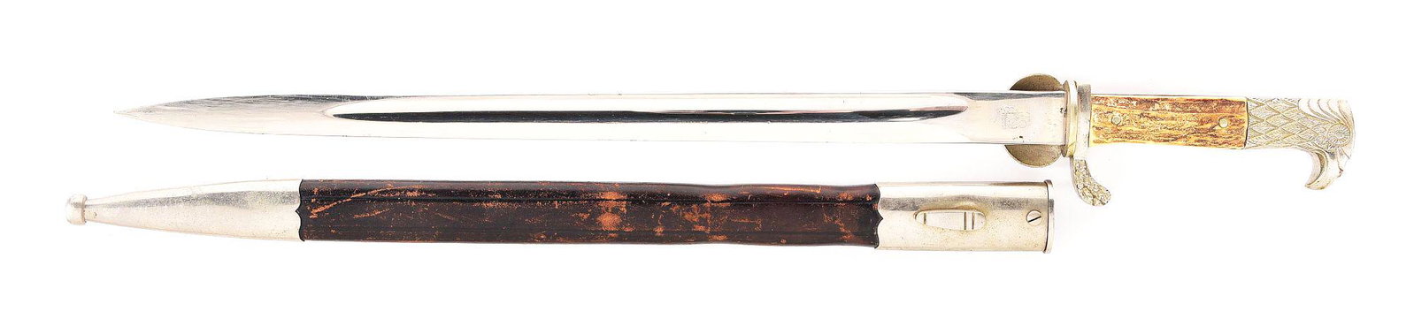 THIRD REICH POLICE CLAMSHELL BAYONET.: Third Reich police clamshell bayonet with a "Original Eickhorn, Solingen" nickel-plated steel blade with light scattered marks throughout. Stag grip panels have a mounted police eagle with light wear,