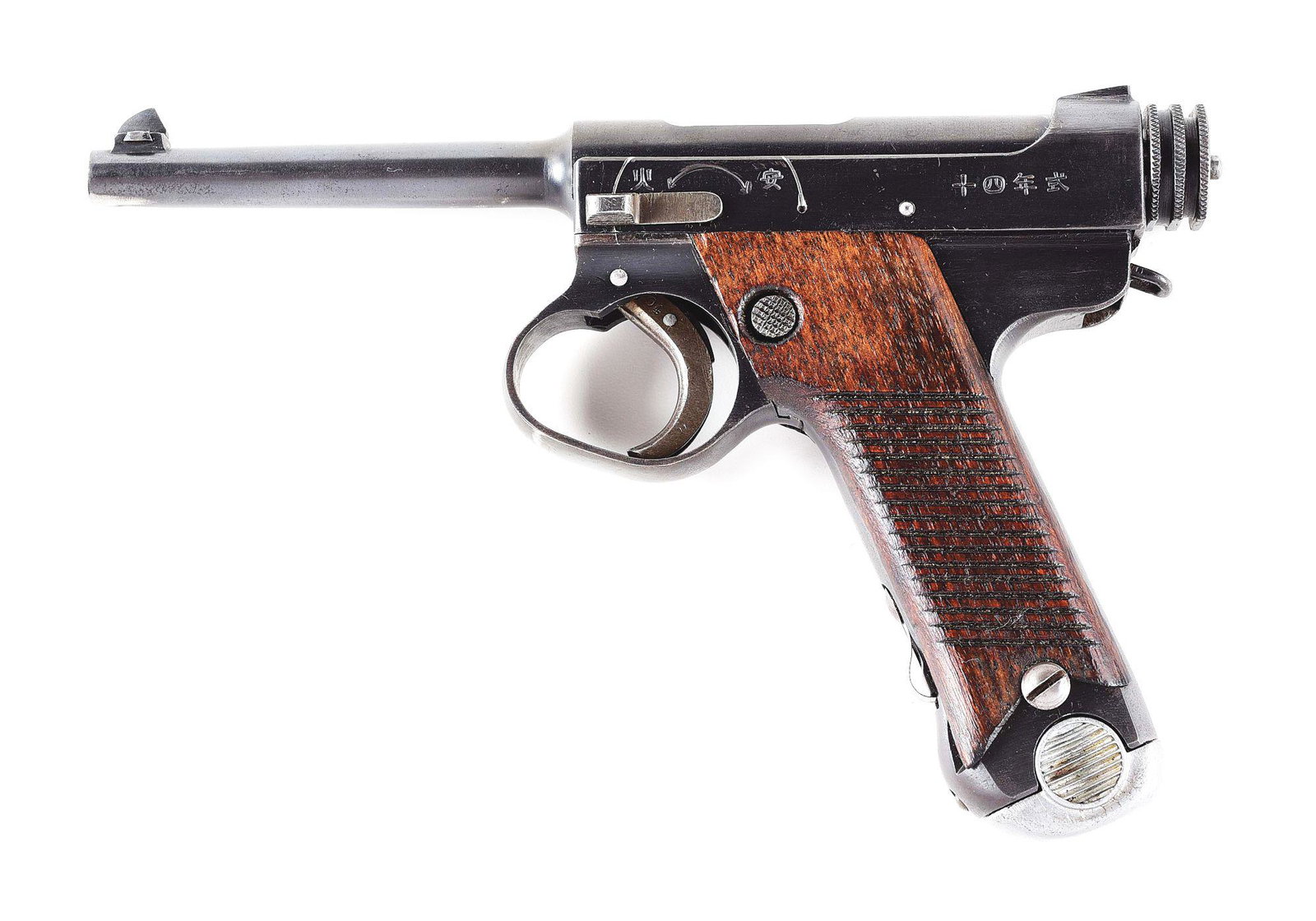 (C) IMPERIAL JAPANESE KOKUBUNJI ARSENAL TYPE 14 NAMBU: Standard configuration Type 14 Nambu manufactured at the Kokubunji arsenal in February of 1940. Left side of frame bears kanji markings stipulating the model designation, with the right bearing the ma