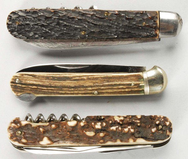 Lot of 3: Large Stag Folder Knives.: Circa 1840 to present C. LUTTERS & CIE 4 – 1/8" 1-blade lock back folding hunter. Handles are genuine stag. Knife is mechanically correct in every respect. Mint condition. Circa 1932 to present Hube