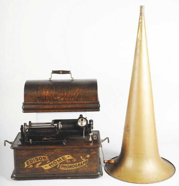 Edison Home Phonograph.: Patent serial number: H192093. Complete with lid. Plays well. Large brass horn with just some minor dents to fluted part. Size: 16" L.